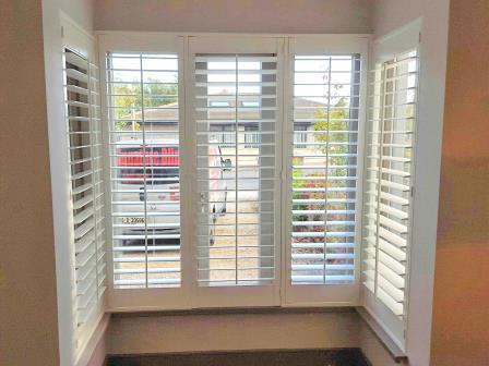 white bay window plantation shutters Bray