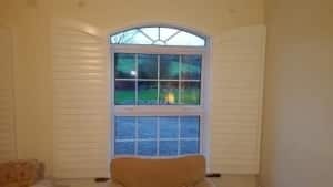Arched shutters open