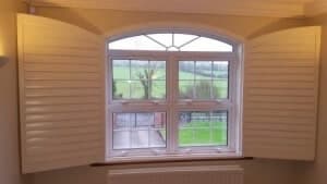Arched Shutters open Ardee