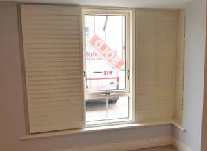 Partly opened sitting room shutters, Dublin