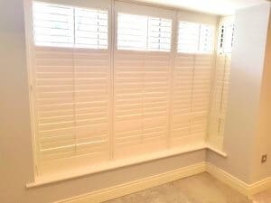 Partly opened shutters sitting room, Greenhills
