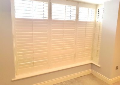 Partly opened shutters sitting room, Greenhills