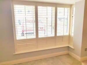 Partly opened shutters sitting room, Greenhills