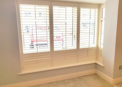 Partly opened shutters sitting room, Greenhills