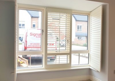 Fully opened sitting room shutters, Dublin