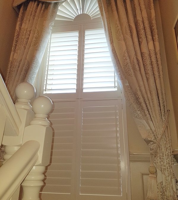 Arched window with Tier on Tier Shutters installed in Dublin City