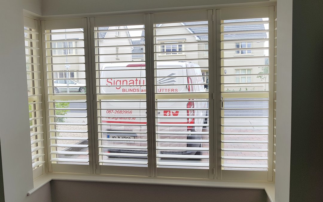 Plantation shutters fitted onto a bay window in County Kildare