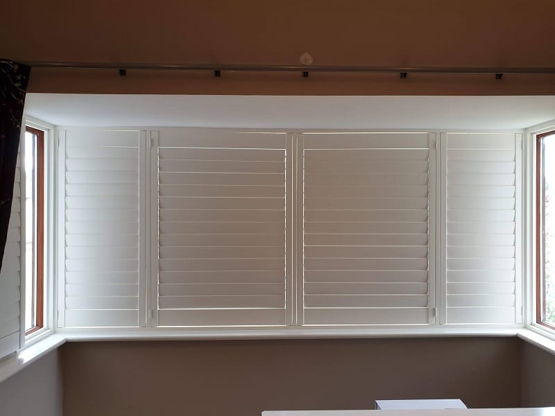 Large Bay window fitted with White Plantation Shutter in Straffan Kildare