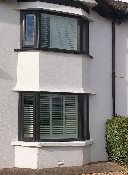 Plantation Shutters installed on 2 front bay windows.