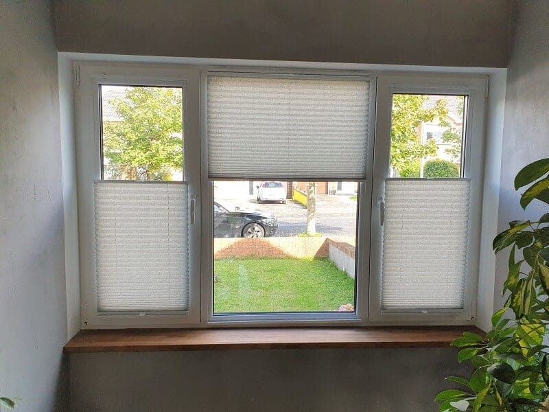 Pleated and Duette blinds installed on Tilt and Turn windows.