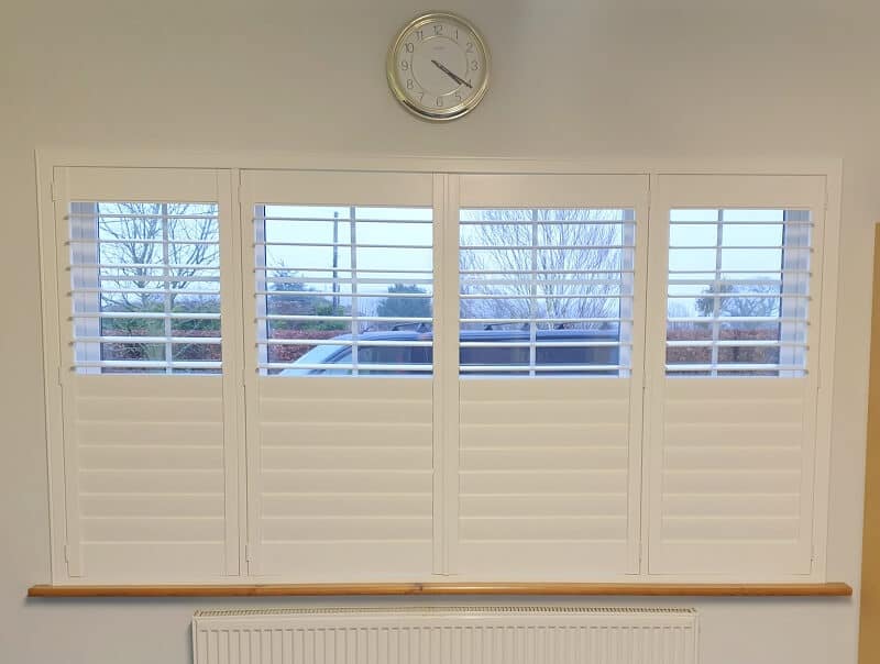 White Plantation Shutters installed in a Large Conservatory.