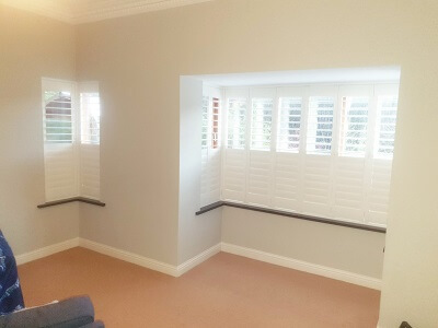 Shutters in Wicklow, Avoca. Plantation Shutters installed on bay windows.