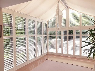 Shaped Solidwood Shutters installed in Clonskeagh