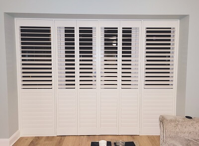 Solidwood Shutter installed in Dun Laoighre. Wood Shutters in Dublin