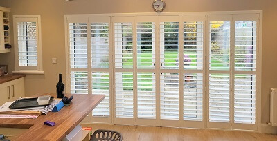 Wood Shutters fitted in Beaumont. Back Door Shutters in Dublin