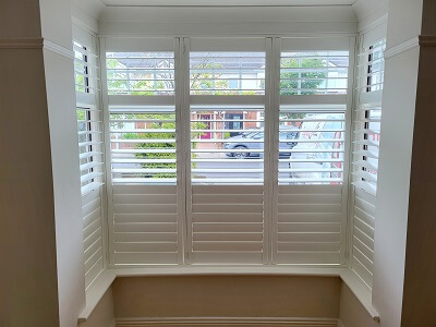 Shutter Blinds on large bay window in Clontarf, Dublin 3.