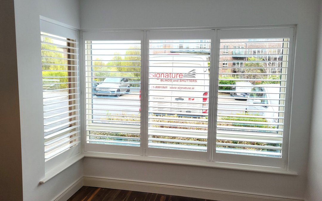 L Shaped Bay Windows fitted with Solid Wood Shutters