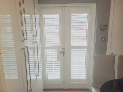 French Door Shutters with a cut out in the door