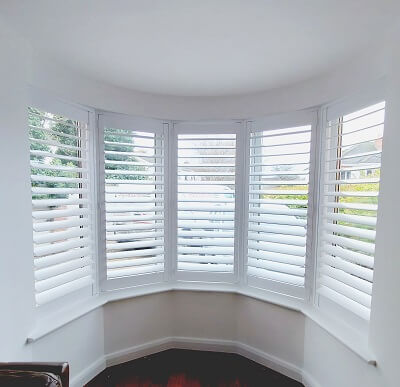 Bay window Shutters installed in Naas. Plantation Shutters Kildare.