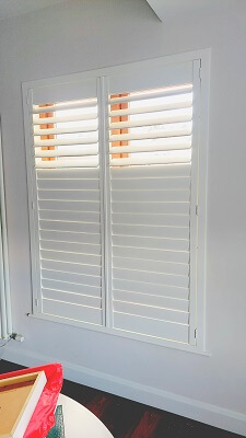 Shutters with uneven panels fitted in Malahide, Dublin