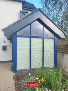 Outside view of Pleated Blinds in a Sunroom
