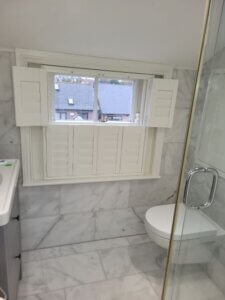 Bi-folding Bathroom Shutters