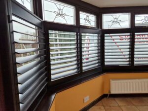 Cafe Style Black Open Shutters