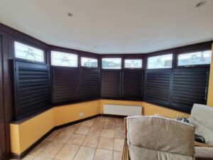 Closed Cafe Style Black Shutters