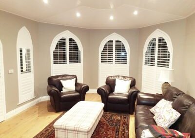 Living Room Cathedral Shutters